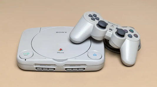 Assorted vintage gaming consoles, including Nintendo 64 and PS2