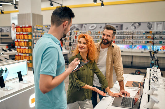 Customer clearing out unused electronics during PayMore Springfield store evaluation