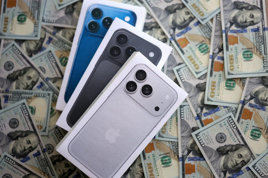 Display of iPhone 11 and newer models available for resale at PayMore Springfield