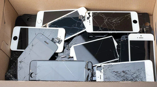 Pile of old smartphones ready for reuse or recycling