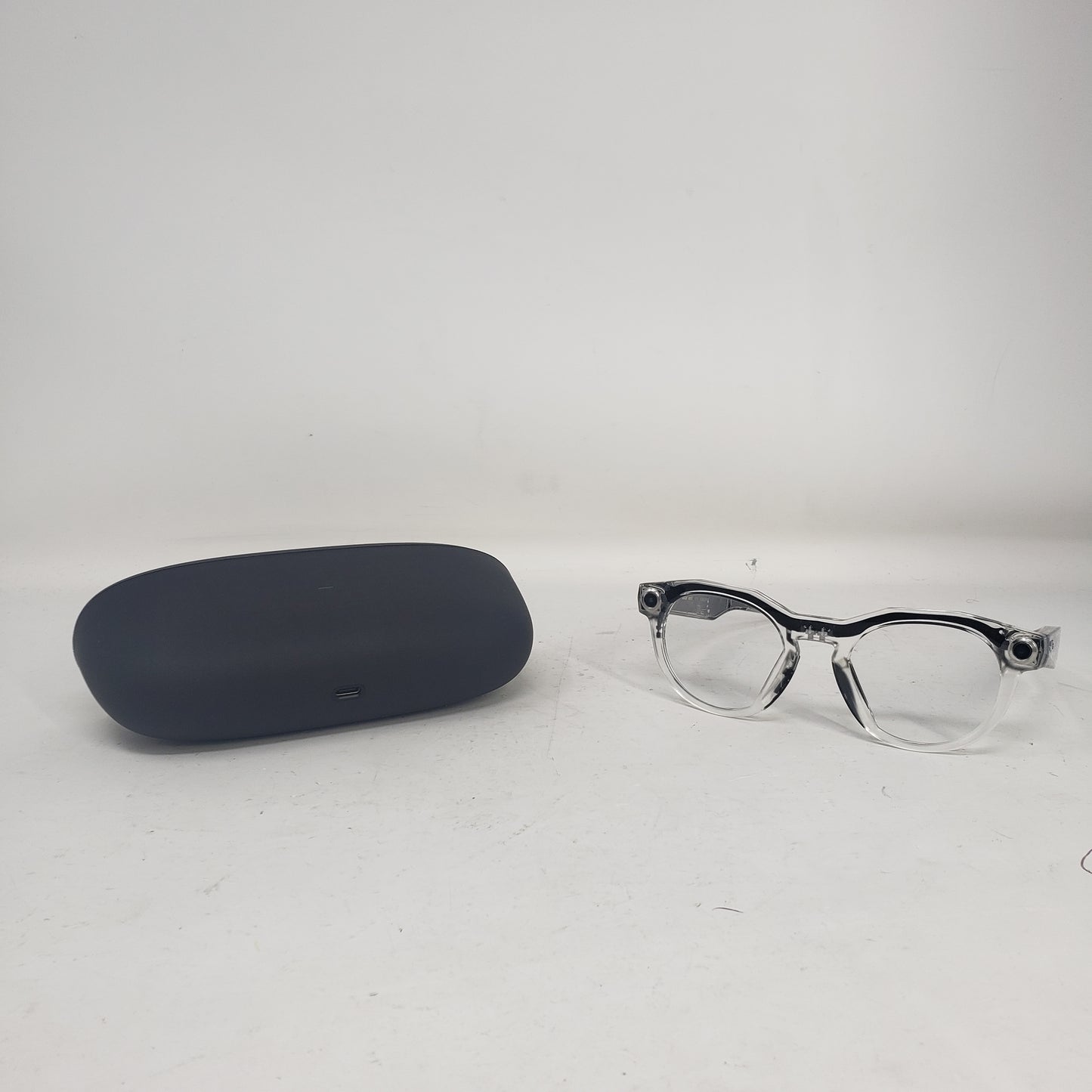 Oakley Meta HSTN AI Smart Glasses Clear Frame Transitions Grey Lenses