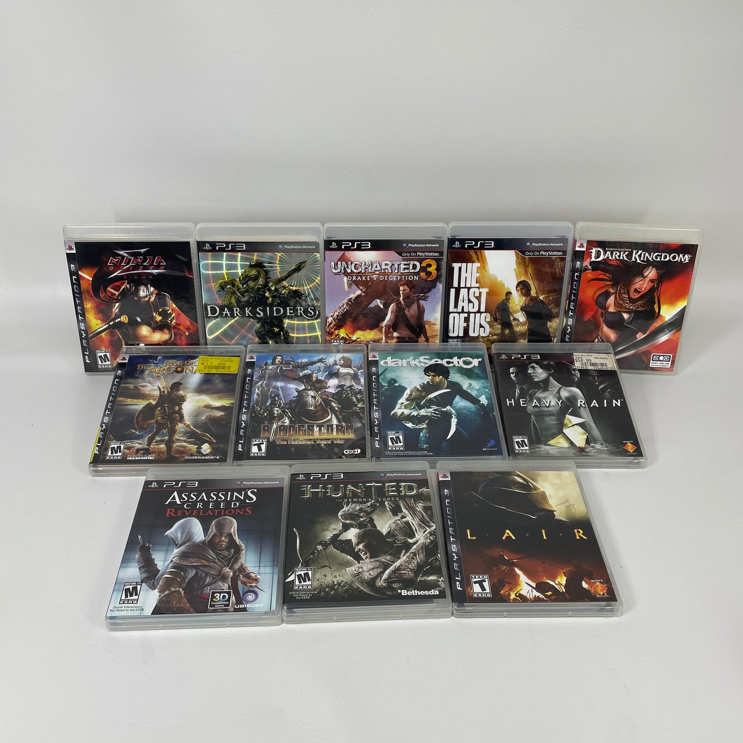 Lot of 12 PS3 Games The Last of Us Uncharted 3 Assassins Creed Heavy Rain 