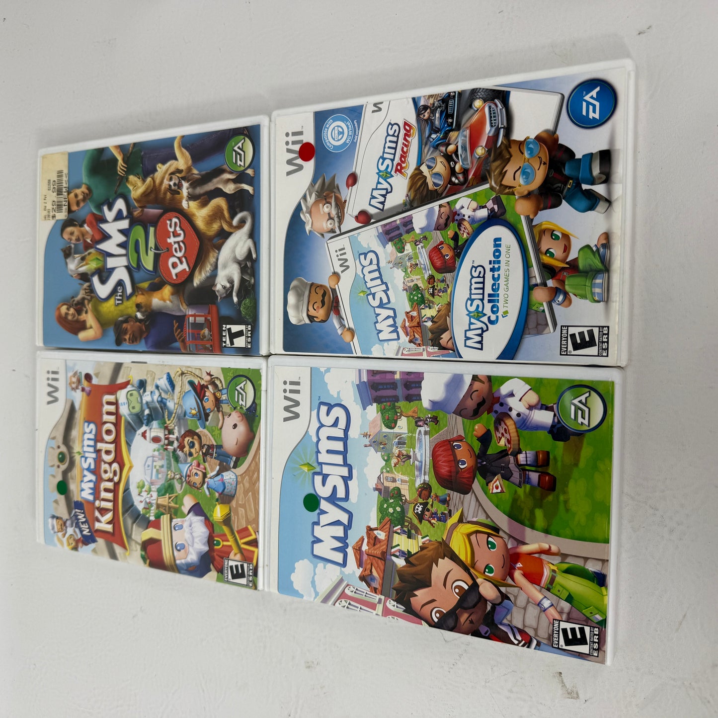 Lot of 4 Nintendo Wii MySim Kingdom, MySim, The Sims 2 Pets & MySim Collection Games