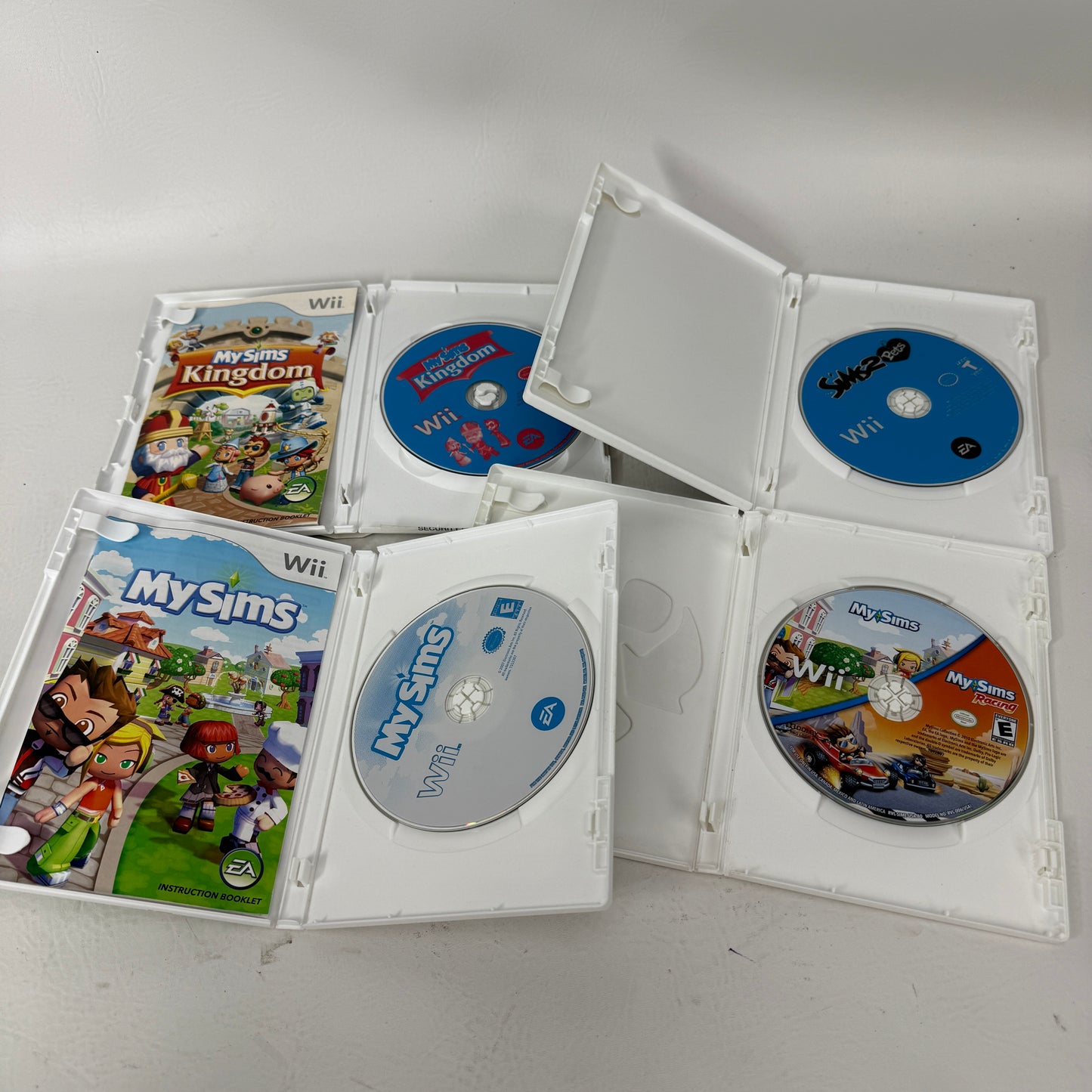 Lot of 4 Nintendo Wii MySim Kingdom, MySim, The Sims 2 Pets & MySim Collection Games